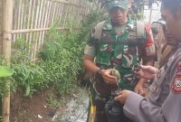 Petugas dari kepolisian dan TNI melakukan cek TKP di lokasi ledakan granat nanas di Kampung Babakan Garut, Desa Cisero, Kecamatan Cisurupan, Kabupaten Garut, Senin (24/6/2024).(Foto: Istimewa)