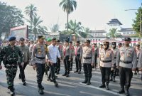 udin menghadiri Apel Gelar Pasukan Operasi Mantap Praja Lodaya 2024 Dalam Rangka Pengamanan Pemilihan Gubernur/Wakil Gubernur Tahun 2024 di Wilayah Hukum Polda Jawa Barat di Jalan Diponegoro, depan Gedung Sate, Kota Bandung, Selasa (20/8/2024).(Foto: Biro Adpim Jabar)